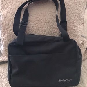 The original Freedom Bag! 10 full-size compartments and 18 banded pockets.